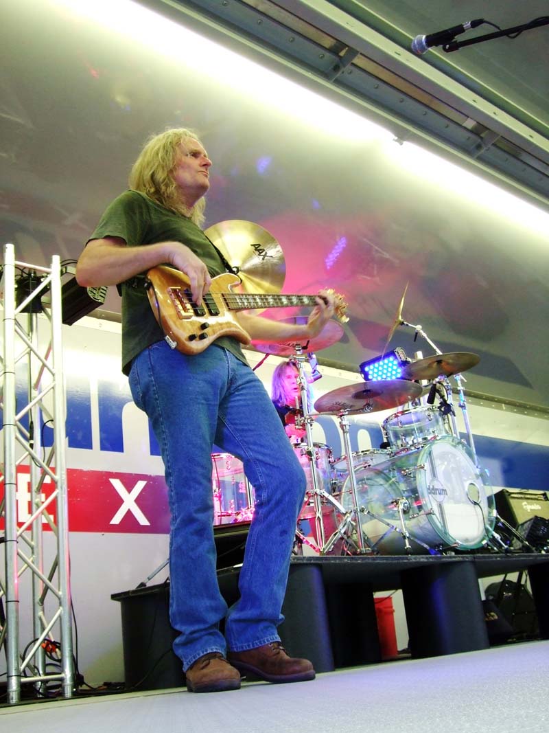 photo of man playing guitar